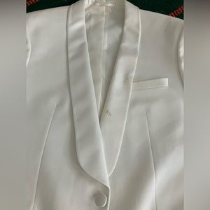 Worn once. slight stain on front (washable).Fits snug on a slim human 👌✨